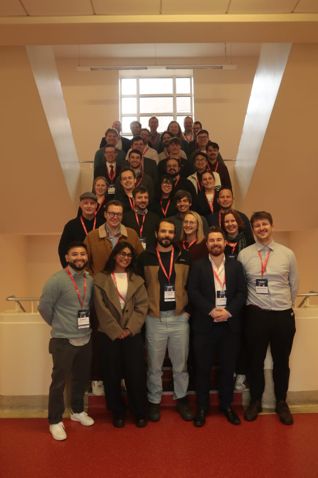 The workshop participants gathered on the staircase of the meeting venue